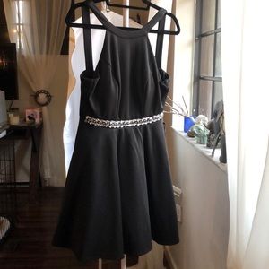 Black dress with rhinestone waist.